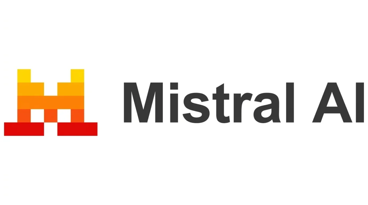 The Mistral AI logo, featuring an orange and yellow pixelated 'M' icon next to the bold text 'Mistral AI' on a clean white background. Mistral is recognized as a powerful open-source ChatGPT alternative for developers and enterprises.