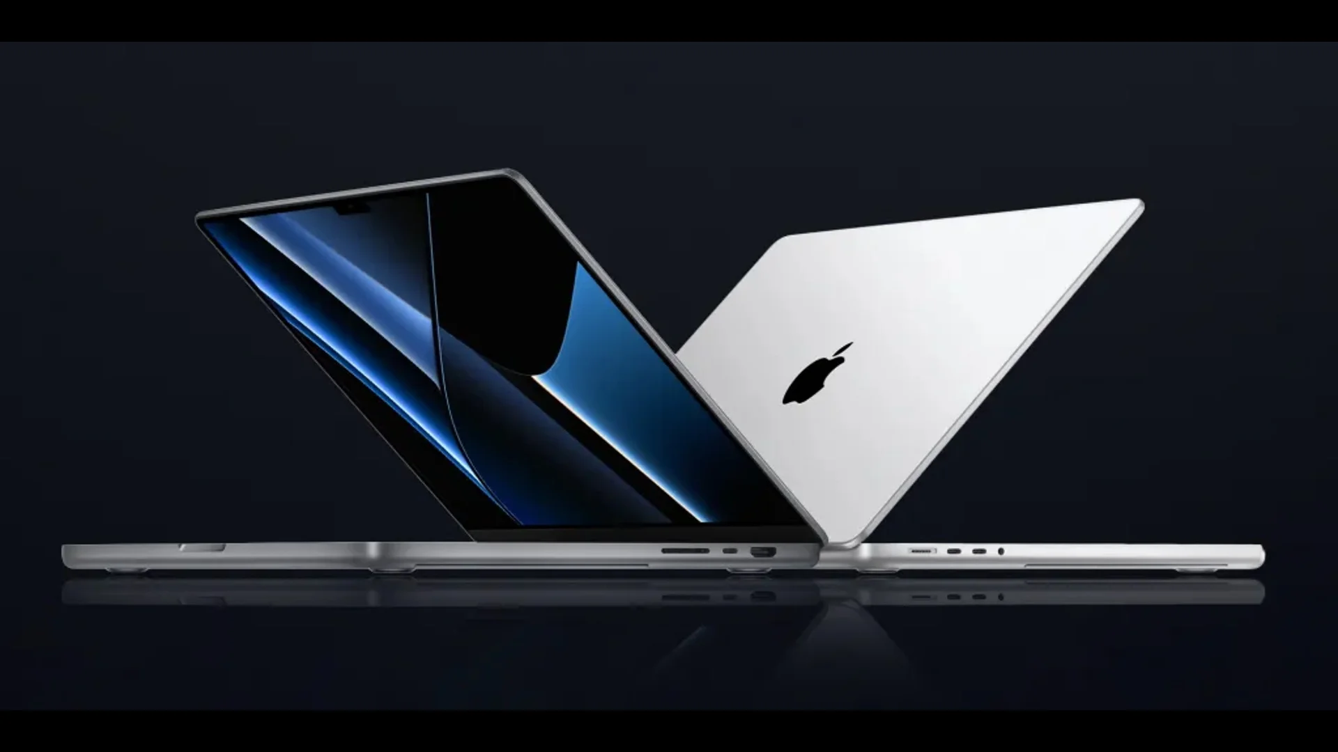 Apple MacBook laptop with slim design and HD display in 16:9 format on dark background