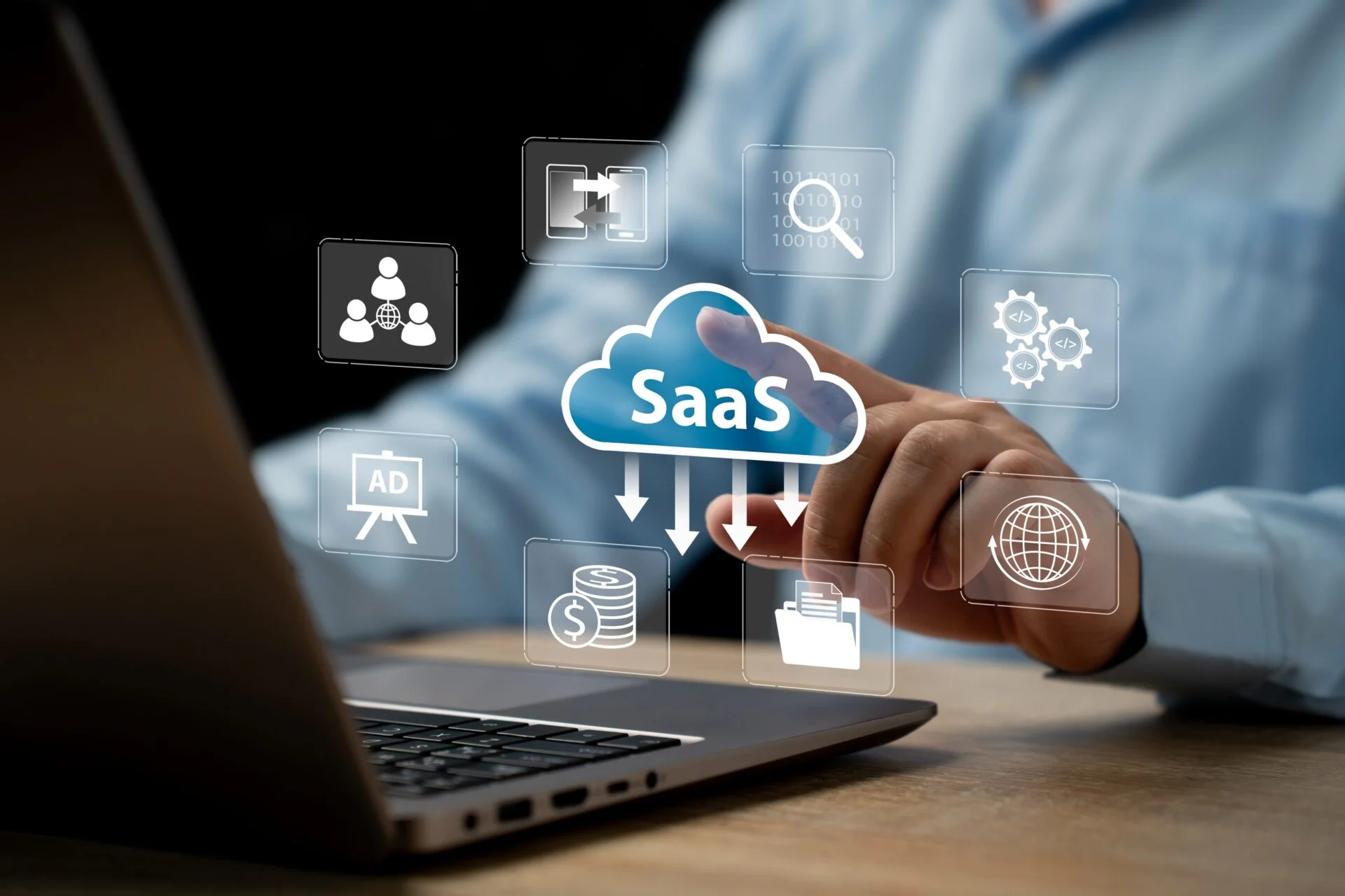 An IT professional interacting with a holographic SaaS cloud icon and data security symbols as part of a comprehensive Cybersecurity Checklist.