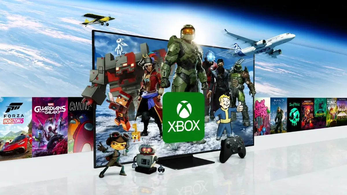 Xbox Game Pass promotional banner showing a TV screen with game characters, an Xbox controller, and a row of game covers in a futuristic sky background.